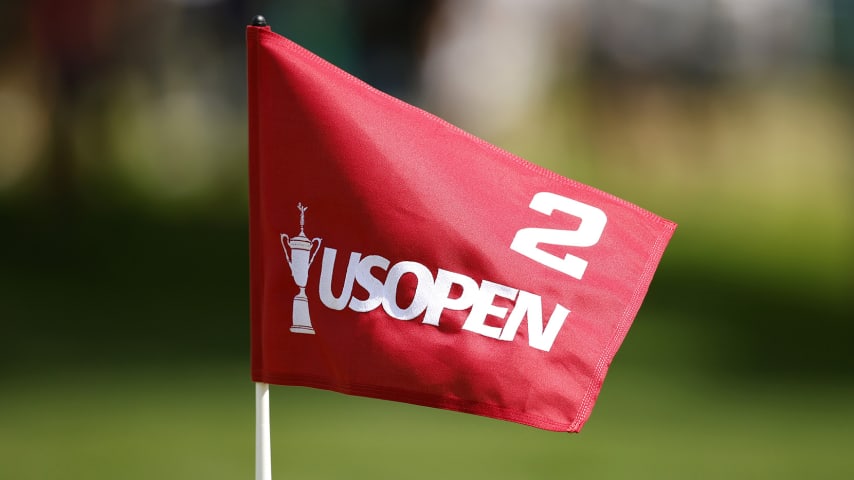 BROOKLINE, MASSACHUSETTS - JUNE 13: A flag blows in the breeze on the second green during a practice round prior to the 2022 U.S. Open at The Country Club on June 13, 2022 in Brookline, Massachusetts. (Photo by Cliff Hawkins/Getty Images)