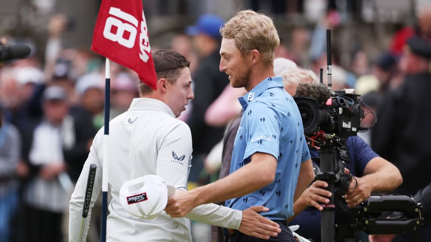 BROOKLINE, MASSACHUSETTS - JUNE 19: (L-R) Matt Fitzpatrick of England shakes hands with Will Zalatoris of the United States after Fitzpatrick's victory on the 18th green during the final round of the 122nd U.S. Open Championship at The Country Club on June 19, 2022 in Brookline, Massachusetts. (Photo by Warren Little/Getty Images)