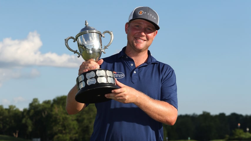 NICHOLASVILLE, KENTUCKY - JULY 10: Trey Mullinax of the United States poses with the trophy after winning the Barbasol Championship at Keene Trace Golf Club on July 10, 2022 in Nicholasville, Kentucky. (Photo by Jamie Squire/Getty Images)