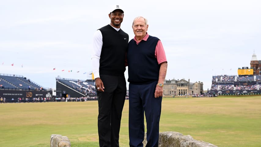ST ANDREWS, SCOTLAND - JULY 11: Tiger Woods of The United States poses for a photo with Jack Nicklaus on the 18th bridge during the Celebration of Champions Challenge during a practice round prior to The 150th Open at St Andrews Old Course on July 11, 2022 in St Andrews, Scotland. (Photo by Ross Kinnaird/Getty Images)