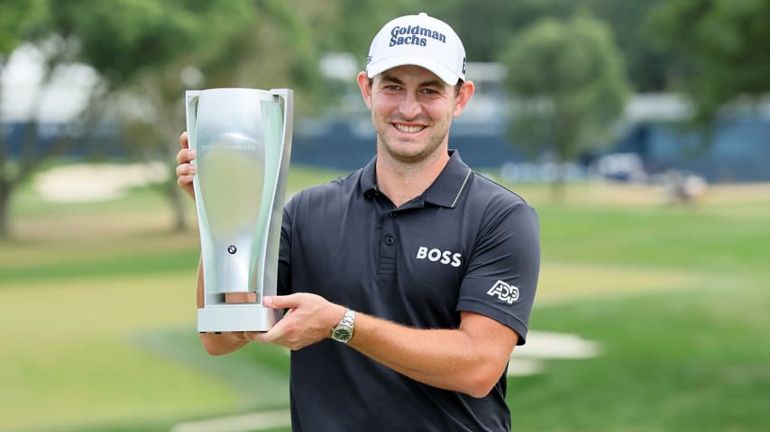 WILMINGTON, DELAWARE - AUGUST 21: Patrick Cantlay of the United States poses with the BMW Trophy after putting in to win on the 18th green during the final round of the BMW Championship at Wilmington Country Club on August 21, 2022 in Wilmington, Delaware. (Photo by Andy Lyons/Getty Images)