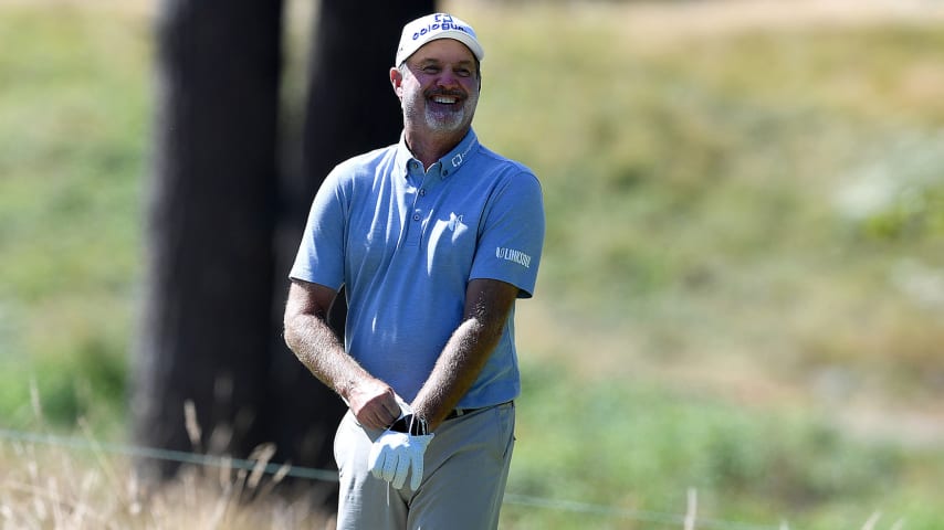 SNOQUALMIE, WASHINGTON - AUGUST 14: Jerry Kelly smiles as he puts on his glove on the tee box on the fifth hole during the final round of the Boeing Classic at The Club at Snoqualmie Ridge on August 14, 2022 in Snoqualmie, Washington. (Photo by Steve Dykes/Getty Images)