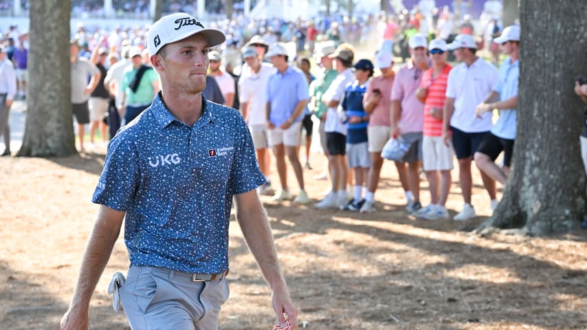 MEMPHIS, TENNESSEE - AUGUST 14: Will Zalatoris prepares to his his second shot near the fence along the 18th hole during the second playoff hole during the first playoff hole during the final round of the FedEx St. Jude Championship at TPC Southwind on August 14, 2022 in Memphis, Tennessee. (Photo by Ben Jared/PGA TOUR via Getty Images)