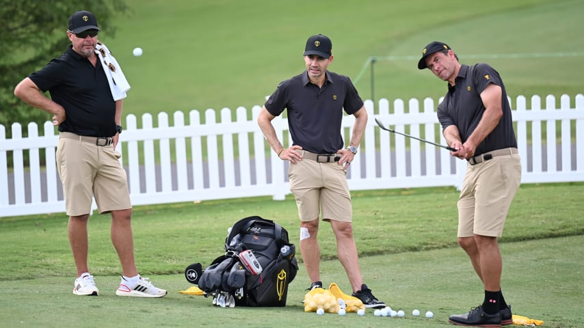 CHARLOTTE, NORTH CAROLINA - SEPTEMBER 20: International Team Assistant Captain Camilo Villegas of Columbia and Adam Scott of Australia on the range prior to Presidents Cup at Quail Hollow September 20, 2022, in Charlotte, North Carolina. (Photo by Keyur Khamar/PGA TOUR via Getty Images)