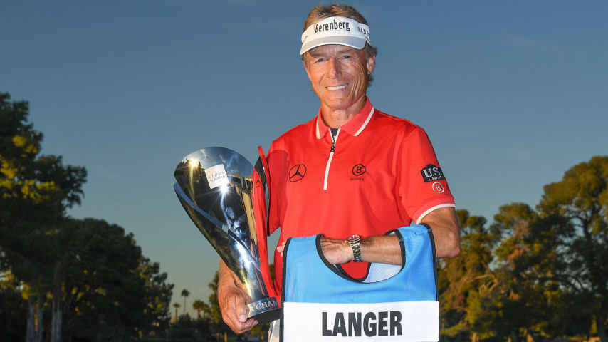 PHOENIX, AZ - NOVEMBER 14: Bernhard Langer of Germany holds the Charles Schwab Cup on the 18th green after the final round of the PGA TOUR Champions Charles Schwab Cup Championship at Phoenix Country Club on November 14, 2021 in Phoenix, Arizona. (Photo by Ben Jared/PGA TOUR via Getty Images)