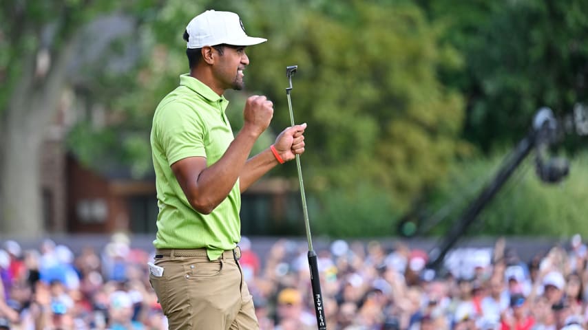 DETROIT, MI - JULY 31: Tony Finau fist pumps on the 18th green after winning the tournament during the final round of the Rocket Mortgage Classic at Detroit Golf Club on July 31, 2022 in Detroit, Michigan. (Photo by Ben Jared/PGA TOUR via Getty Images)