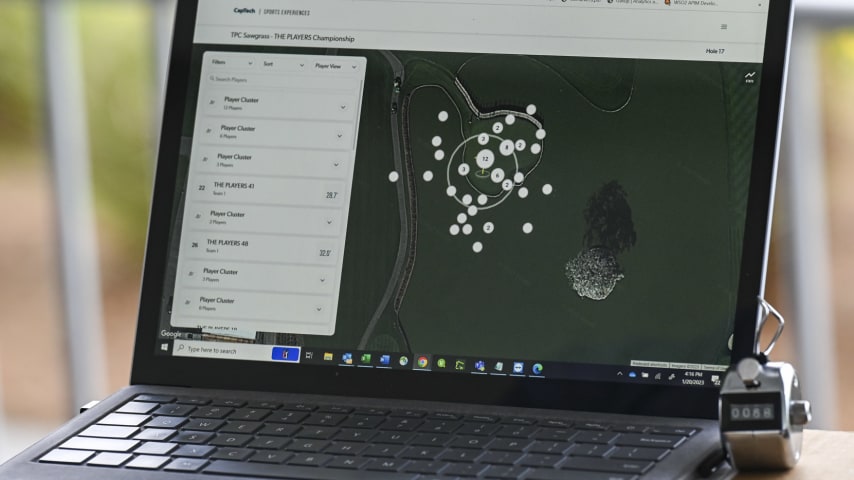 Members of the Shotlink team track play on the 17th hole on the Stadium Course at TPC Sawgrass, home of THE PLAYERS Championship, on January 20, 2023 in Ponte Vedra Beach, Florida. (Photo by Keyur Khamar/PGA TOUR via Getty Images)