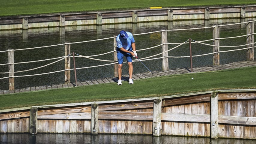 A player putts on the isthmus connecting the island green of the 17th hole on the Stadium Course at TPC Sawgrass, home of THE PLAYERS Championship, on January 20, 2023 in Ponte Vedra Beach, Florida. (Photo by Keyur Khamar/PGA TOUR via Getty Images)