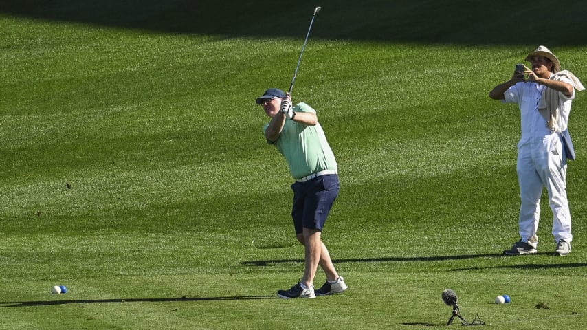 A caddie films a player on the tee box on the 17th hole of the Stadium Course at TPC Sawgrass, home of THE PLAYERS Championship, on January 20, 2023 in Ponte Vedra Beach, Florida. (Photo by Keyur Khamar/PGA TOUR via Getty Images)