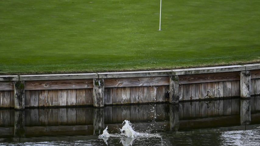 A ball splashes in the water just left of the green on the 17th hole on the Stadium Course at TPC Sawgrass, home of THE PLAYERS Championship, on January 20, 2023 in Ponte Vedra Beach, Florida. (Photo by Keyur Khamar/PGA TOUR via Getty Images)