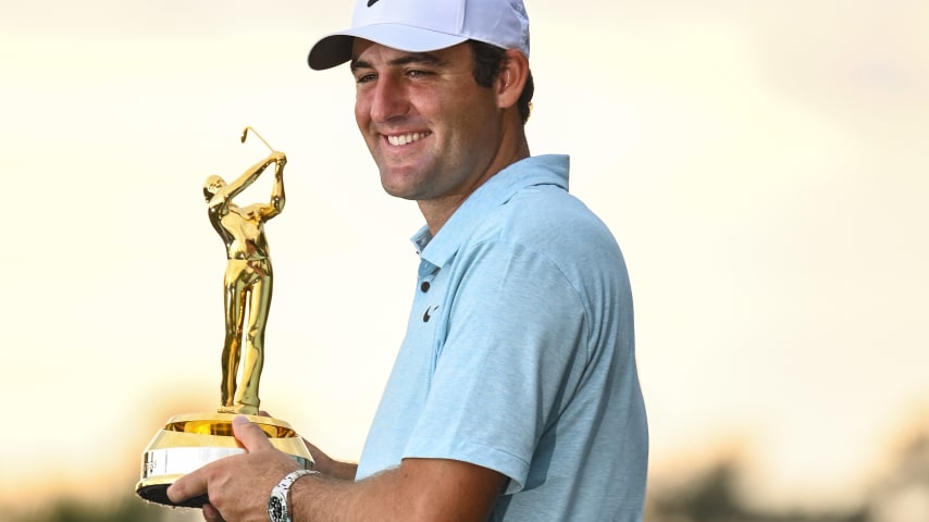 PONTE VEDRA BEACH, FLORIDA - MARCH 12:  Scottie Scheffler smiles with the tournament trophy after his five stroke victory in the final round of THE PLAYERS Championship on the Stadium Course at TPC Sawgrass on March 12, 2023 in Ponte Vedra Beach, Florida. (Photo by Keyur KhamarPGA TOUR via Getty Images)