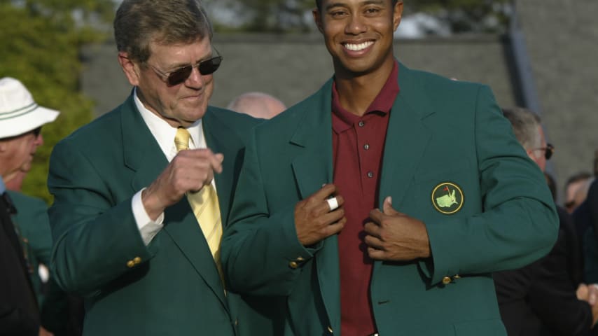 14 Apr 2002:  Tiger Woods of the USA is presented with his green jacket by Hootie Johnson after winning the Masters Tournament from the Augusta National Golf Club in Augusta, Georgia. DIGITAL IMAGE. EDITORIAL USE ONLY Mandatory Credit: Craig Jones/GettyImages