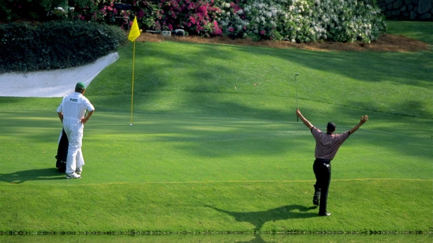 11 Apr 1999:  Tiger Woods of the USA chips in from the side of the 12th green during the 1999 US Masters at the Augusta National GC in Augusta, Georgia, USA.  \ Mandatory Credit: David Cannon /Allsport