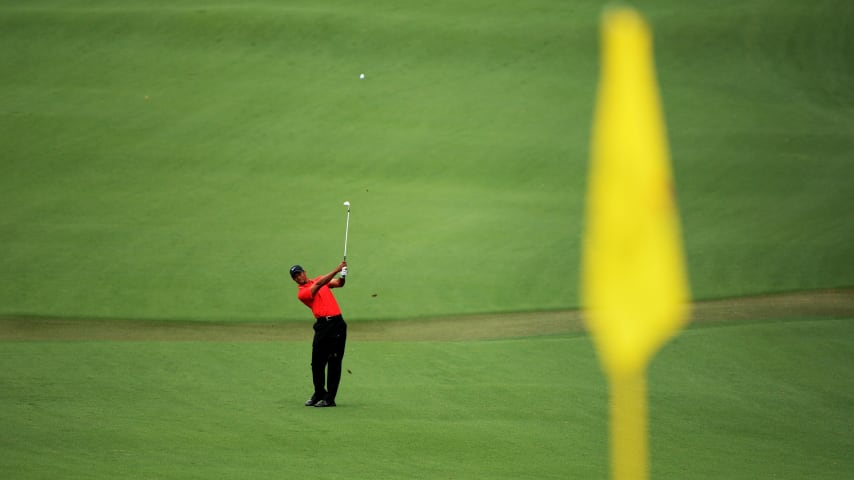 AUGUSTA, GA - APRIL 14:  Tiger Woods of the United States hits a shot on the second hole during the final round of the 2013 Masters Tournament at Augusta National Golf Club on April 14, 2013 in Augusta, Georgia.  (Photo by Harry How/Getty Images)