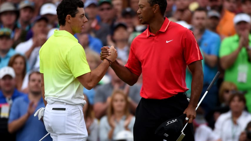 AUGUSTA, GA - APRIL 12:  Rory McIlroy of Northern Ireland and Tiger Woods of the United States shake hands on the 18th green during the final round of the 2015 Masters at Augusta National Golf Club on April 12, 2015 in Augusta, Georgia.  (Photo by Ross Kinnaird/Getty Images)