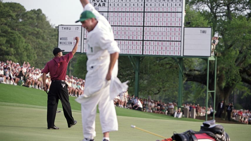 8 Apr 2001:  Tiger Woods and his Caddie Steve Williams celebrate on the green after he wins The Masters at the Augusta National Golf Club in Augusta, Georgia.   NOTE TO USER: It is expressly understood that the only rights Allsport are offering to license in this Photograph are one-time, non-exclusive editorial rights. No advertising or commercial uses of any kind may be made of Allsport photos. User acknowledges that it is aware that Allsport is an editorial sports agency and that NO RELEASES OF ANY TYPE ARE OBTAINED from the subjects contained in the photographs.Mandatory Credit: Stephen Munday/ALLSPORT
