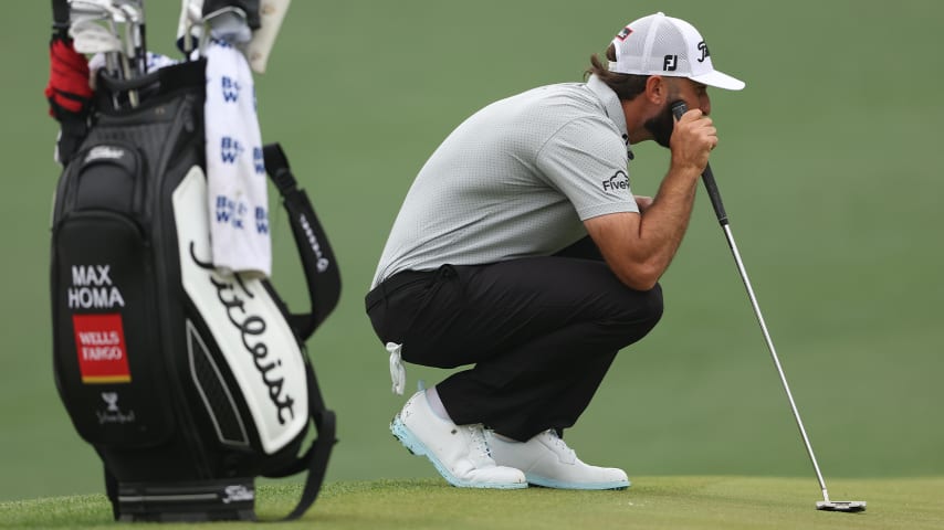 Max Homa eyes a putt in his Tuesday practice round at the Masters. (Christian Peterson/Getty Images)