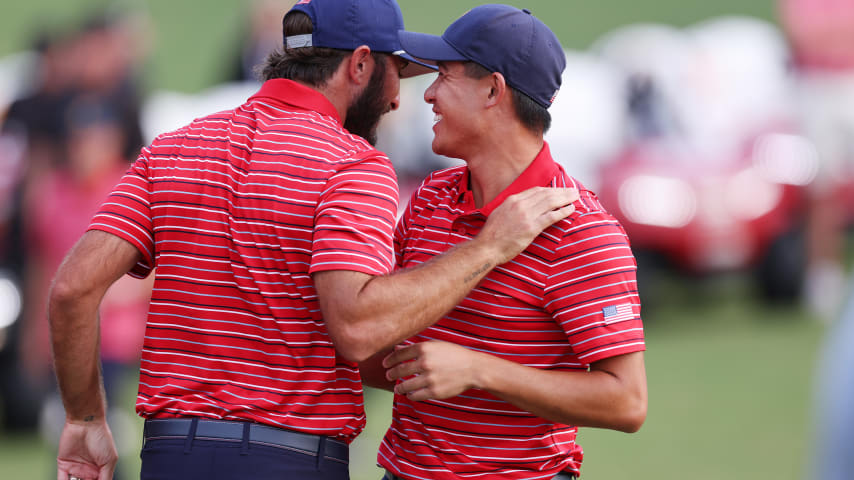 CHARLOTTE, NORTH CAROLINA - SEPTEMBER 25: (L-R) Max Homa and Collin Morikawa of the United States Team celebrate defeating the International Team during  day four of the 2022 Presidents Cup at Quail Hollow Country Club on September 25, 2022 in Charlotte, North Carolina. (Photo by Rob Carr/Getty Images)