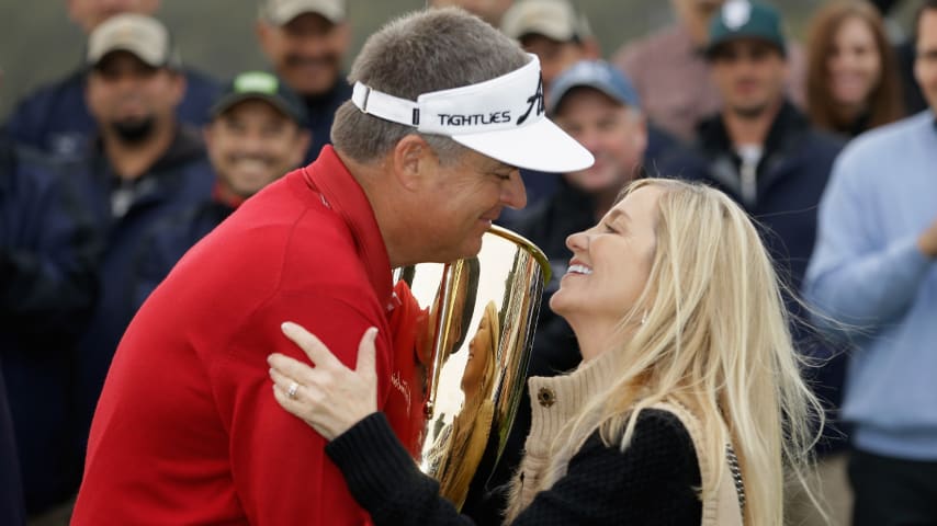 Kenny Perry celebrates with wife Sandy after winning the Charles Schwab Cup season-long championship in 2013 (Ezra Shaw/Getty Images)