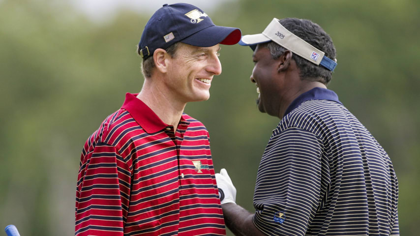 UNITED STATES - SEPTEMBER 24:  Jim Furyk of the U.S. team and Vijay Singh of the International team during the foursome matches in the third round of The Presidents Cup at Robert Trent Jones Golf Club in Prince William County, Virginia on September 24, 2005.  (Photo by J Rogash/Getty Images)