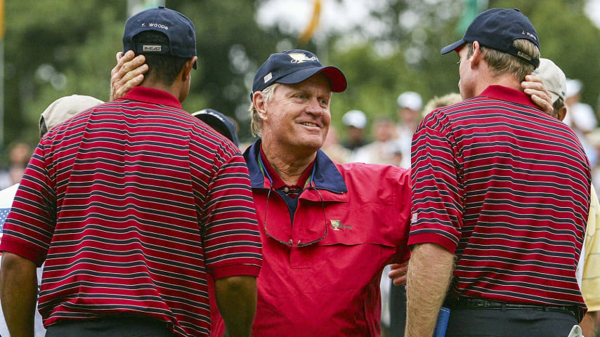 GAINESVILLE, VA - SEPTEMBER 24:  USA team captian Jack Nicklaus greets his players Tiger Woods and Jim Furyk after they won 2up during the Saturday Four-Ball Matches at the 2005 Presidents Cup on September 24, 2005 at Robert Trent Jones Golf Club in Gainesville, Virginia. (Photo by Scott Halleran/Getty Images)