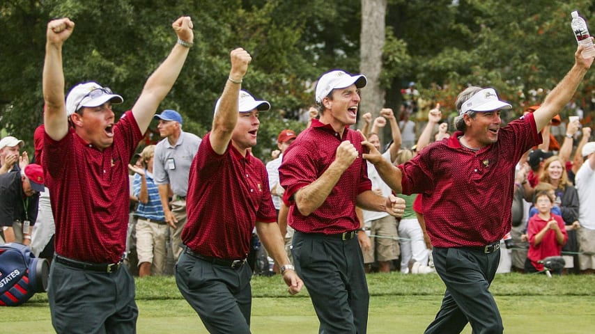 GAINESVILLE, VA - SEPTEMBER 25:  Members of the USA team, (L-R) Justin Leonard, Scott Verplank; Jim Furyk and Fred Couples celebrate after Chris DiMarco made birdie on the 18th hole gave the USA a 18.5 to 15.5 victory at the 2005 Presidents Cup on September 25, 2005 at Robert Trent Jones Golf Club in Gainesville, Virginia.  (Photo by Scott Halleran/Getty Images)