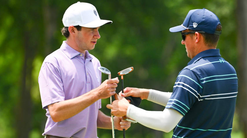 The clubs Ph.D. student and violinist William Knauth is using at the AT&T Byron Nelson