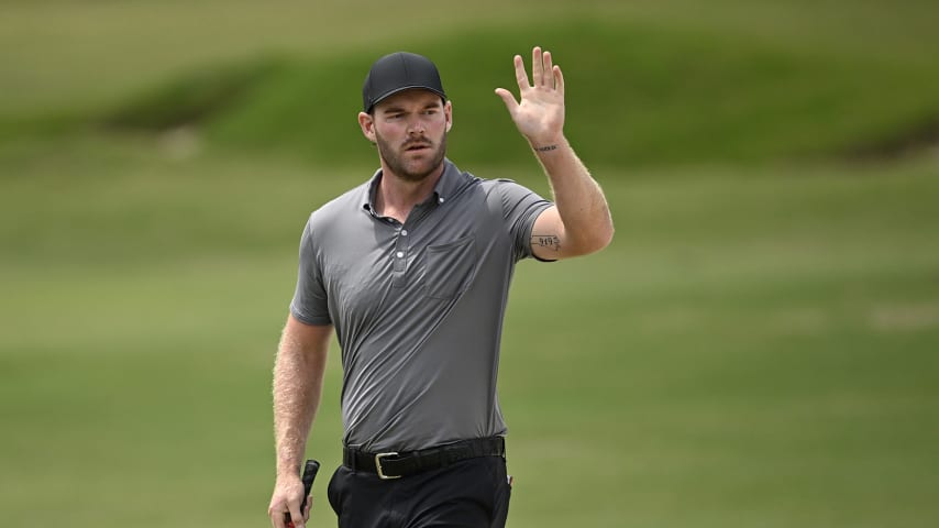 RALEIGH, NORTH CAROLINA - JUNE 04: Grayson Murray salutes the gallery on the ninth hole during the final round of the UNC Health Championship presented by STITCH at Raleigh Country Club on June 04, 2023 in Raleigh, North Carolina. (Photo by Grant Halverson/Getty Images)