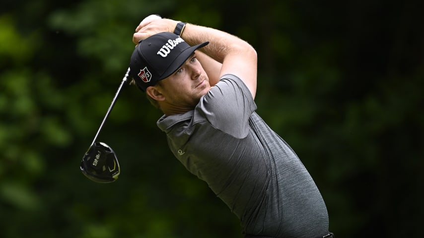 RALEIGH, NORTH CAROLINA - JUNE 04: John Augenstein plays his tee shot on the second hole during the final round of the UNC Health Championship presented by STITCH at Raleigh Country Club on June 04, 2023 in Raleigh, North Carolina. (Photo by Grant Halverson/Getty Images)