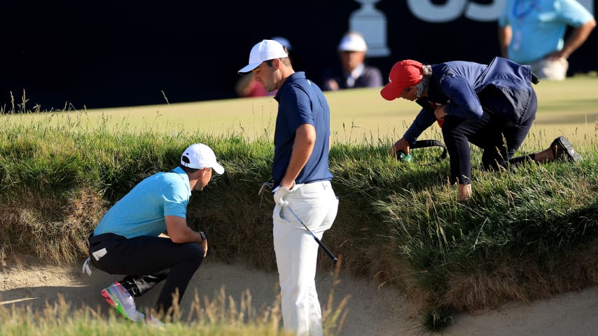 Rory McIlroy and Scottie Scheffler by the 14th green during the final round of the U.S. Open. (David Cannon/Getty Images)