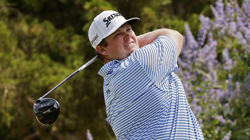 NORMAN, OKLAHOMA - JUNE 25: Patrick Newcomb of the United States hits a tee shot on the 18th hole during the final round of the Compliance Solutions Championship at Jimmie Austin OU Golf Club on June 25, 2023 in Norman, Oklahoma. (Photo by Mike Mulholland/Getty Images)
