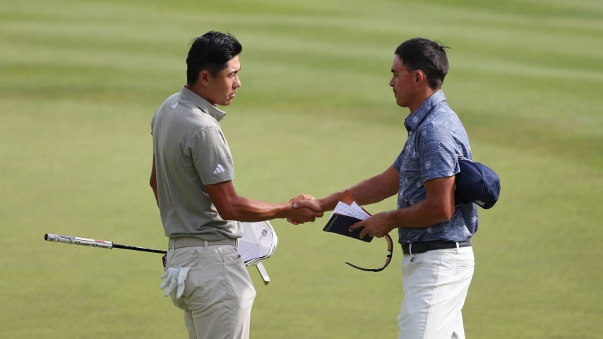 CROMWELL, CONNECTICUT - JUNE 22: (L-R) Collin Morikawa of the United States and Rickie Fowler of the United States shake hands on the 18th green during the first round of the Travelers Championship at TPC River Highlands on June 22, 2023 in Cromwell, Connecticut. (Photo by Rob Carr/Getty Images)