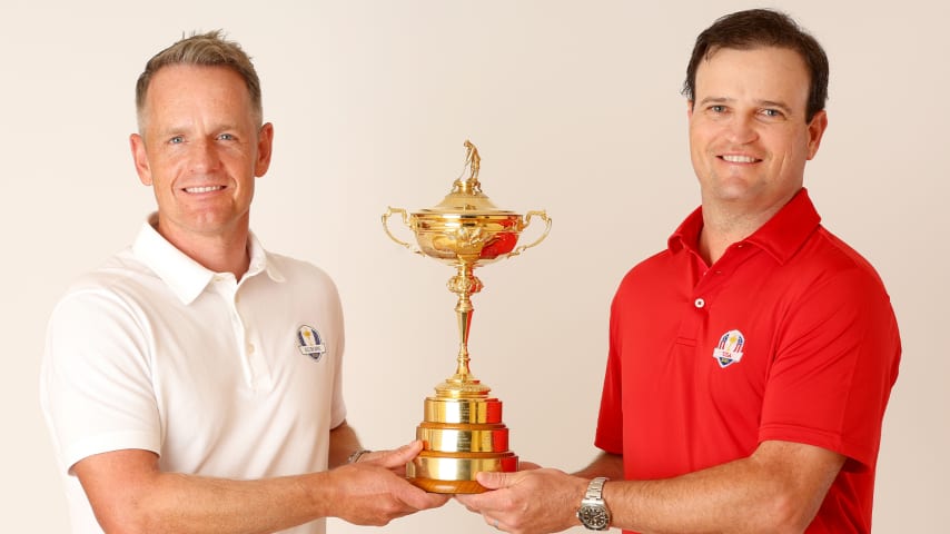 Team Captains Luke Donald of England (left) and Zach Johnson of The United States (right) pose for a photograph with the Ryder Cup Trophy in Rome, Italy. (Andrew Redington/Getty Images)