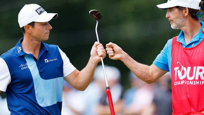 Viktor Hovland and his caddy Shay Knight in the final round of the TOUR Championship.