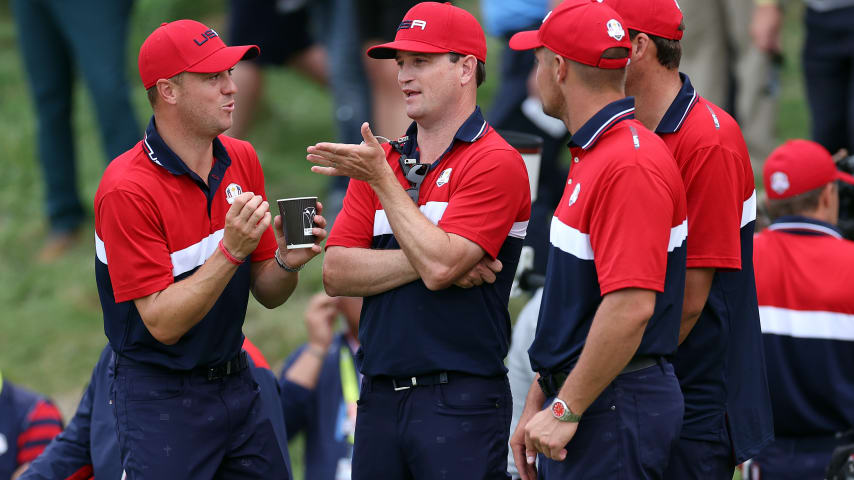 KOHLER, WISCONSIN - SEPTEMBER 26:  Justin Thomas of team United States talks with vice-captain Zach Johnson and Daniel Berger of team United States during Sunday Singles Matches of the 43rd Ryder Cup at Whistling Straits on September 26, 2021 in Kohler, Wisconsin. (Photo by Richard Heathcote/Getty Images)