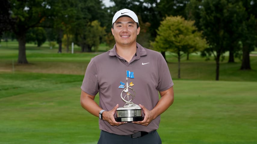 COLUMBUS, OHIO - SEPTEMBER 24: Norman Xiong of the United States poses with the trophy after winning the Nationwide Children's Hospital Championship at Ohio State University Golf Club on September 24, 2023 in Columbus, Ohio. (Photo by Dylan Buell/Getty Images)