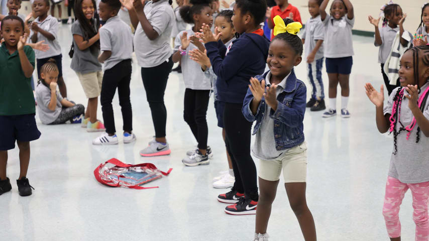 Children participating in Blessings in a Backpack (Photo Credit: William Estep/Nemours Children's Health System)