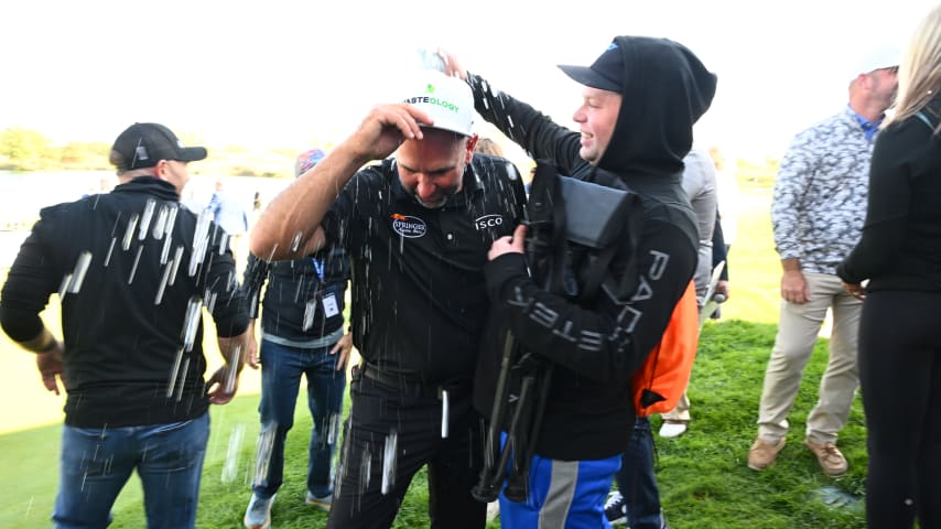 NEWBURGH, INDIANA - OCTOBER 08: Josh Teater gets sprayed with water on 18th hole during the final round of the Korn Ferry Tour Championship presented by United Leasing and Financing at Victoria National Golf Club on October 8, 2023 in Newburgh, Indiana. (Photo by Jennifer Perez/PGA TOUR)