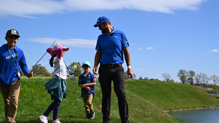 NEWBURGH, INDIANA - OCTOBER 08: Tom Whitney celebrates being TOURBound with his kids on the ninth hole during the final round of the Korn Ferry Tour Championship presented by United Leasing and Financing at Victoria National Golf Club on October 8, 2023 in Newburgh, Indiana. (Photo by Jennifer Perez/PGA TOUR)