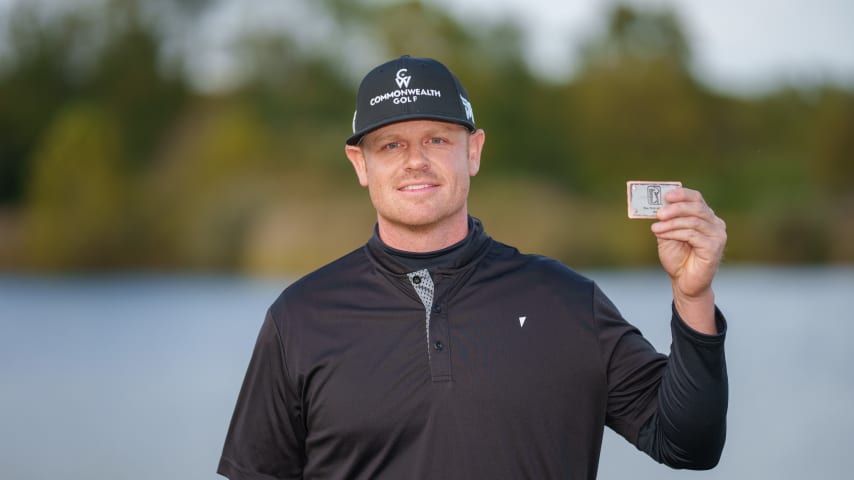 NEWBURGH, INDIANA - OCTOBER 08: Patrick Fishburn of the United States poses for a photo with his PGA TOUR card after the final round of the Korn Ferry Tour Championship presented by United Leasing and Finance at Victoria National Golf Club on October 8, 2023 in Newburgh, Indiana. (Photo by Andrew Wevers/PGA TOUR)