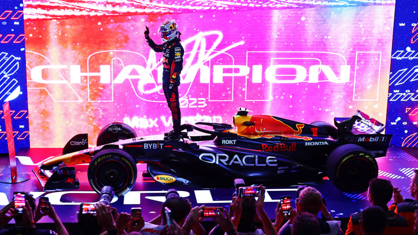 Max Verstappen of Oracle Red Bull Racing celebrates on his car in parc ferme after winning the 2023 F1 World Drivers Championship. (Clive Rose/Getty Images)