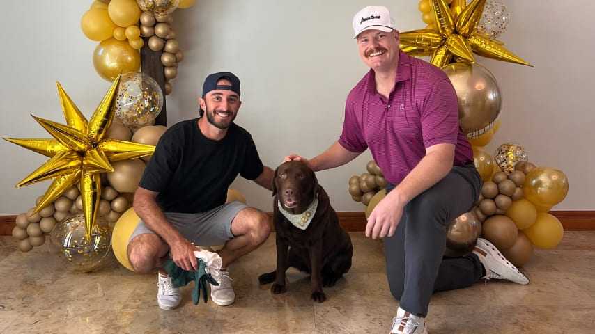 Max Homa and fellow Gala event co-chair Connor Tryhus recently visiting with their K9 therapy service dog, Leo. (Arizona Cancer Foundation for Children)