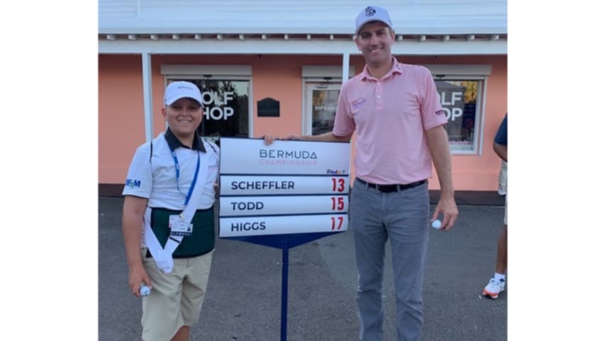 Oliver Betschart  as a standard bearer at the 2019 Butterfield Bermuda Championship with winner Brendon Todd.