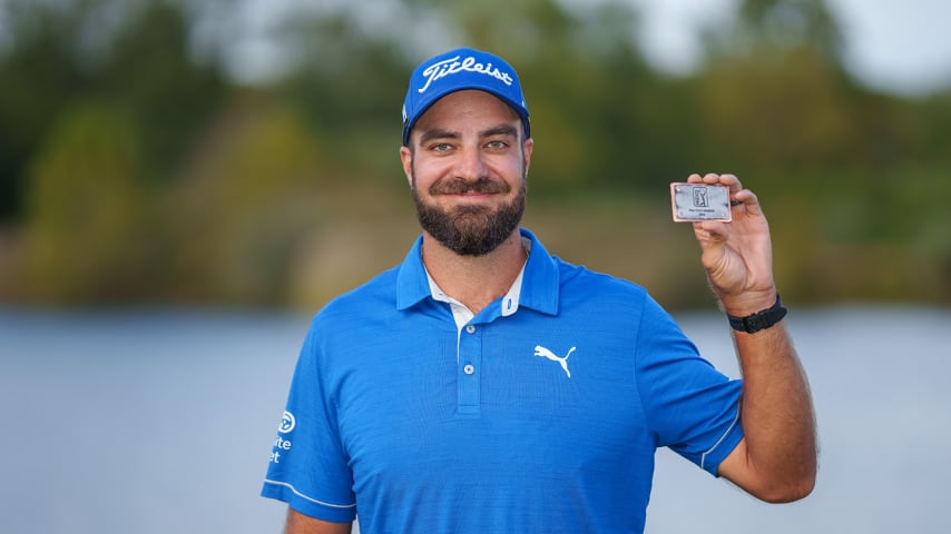 NEWBURGH, INDIANA - OCTOBER 08: Tom Whitney of the United States poses for a photo with his PGA TOUR card after the final round of the Korn Ferry Tour Championship presented by United Leasing and Finance at Victoria National Golf Club on October 8, 2023 in Newburgh, Indiana. (Photo by Andrew Wevers/PGA TOUR)