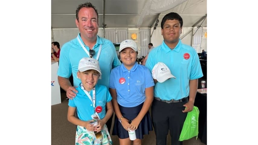 Jeff Scott, First Tee Diamante Director of Operations, with kids at First Tee Diamante. (Courtesy of World Wide Technology)