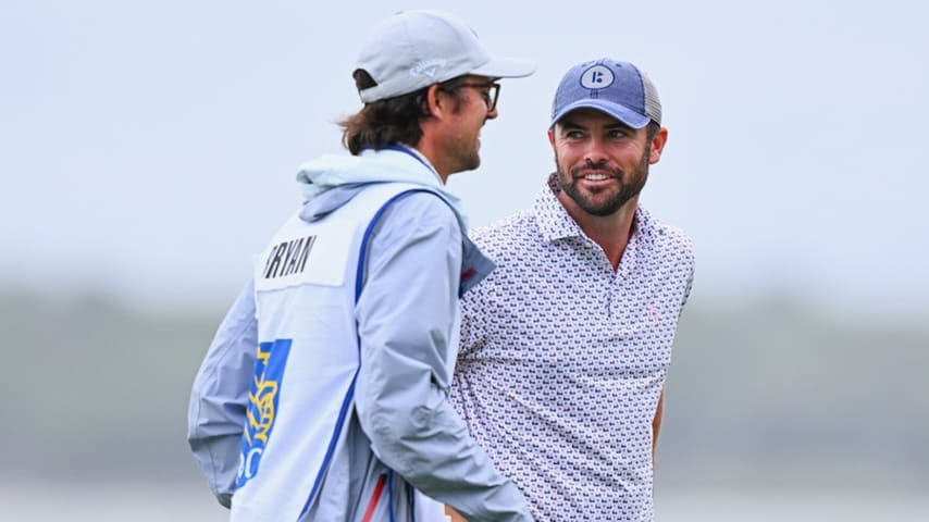 George Bryan (left) caddying for his brother Wesley (right). (Tracy Wilcox/PGA TOUR)