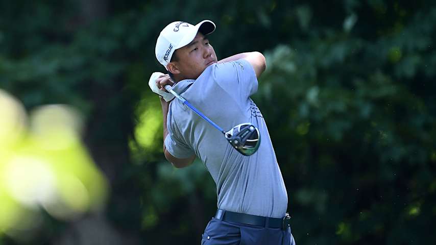 SILVIS, IL - JULY 12: Norman Xiong hits his tee shot on the 17th hole during the first round of the John Deere Classic at TPC Deere Run on July 12, 2018 in Silvis, Illinois. (Photo by Stacy Revere/Getty Images)