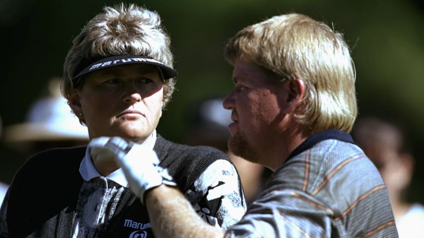 Laura Davies (left) and John Daly (right) chat during the 1998 JCPenney Classic in Westin Innisbrook Resort in Palm Harbor, Florida. (Vincent Laforet/Allsport)