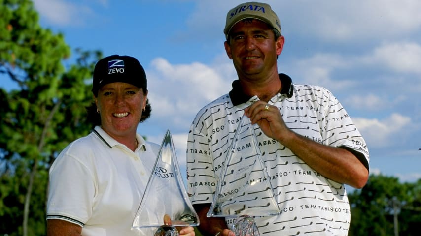 Meg Mallon and Steve Pate pose with their trophies at the 1998 JCPenney Classic at the Innisbrook Resort in Palm Harbor, Florida. (Vincent Laforet/Allsport)