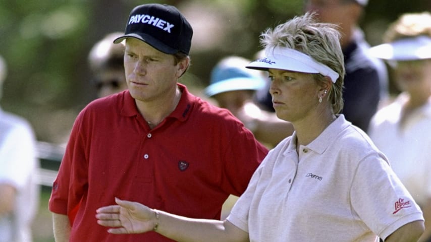 Dottie Pepper (right) chats with Jeff Sluman during the 1998 JCPenney Classic in Innisbrook Resort in Palm Harbor, Florida. (Vincent Laforet/Allsport)